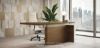 Scrivania direzionale elevabile Mux con piano in legno impiallacciato spessore 51 mm, struttura composta da elemento centrale e pannello laterale, sistema regolabile in altezza con 2 colonne e corsa di 40 cm, consolle rivestita in pelle Cat. P, carter metallico finitura champagne e dettagli metallici verniciati a polveri epossidiche goffrate.