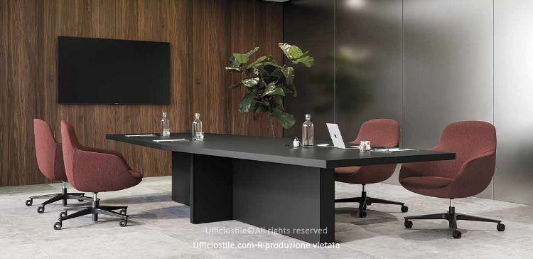 Tavolo riunione a botte Mux70 da 280 x 120 cm con piano in Fenix NTM spessore totale 52 mm, laminato HPL sul lato non a vista, bordatura in ABS spessore 1 mm con spigoli raggiati e dettagli metallici verniciati a polveri epossidiche nero RAL 9005 goffrato.
