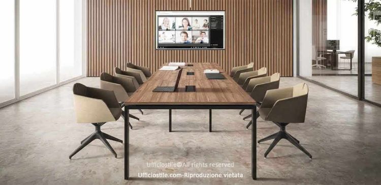 Tavolo riunione da 360 x 122,5 cm con struttura a ponte in acciaio verniciato a polveri epossidiche, piano spessore 25 mm in pannello ecologico FSC® nobilitato antigraffio, tre sportelli passacavi con vaschette portacavi integrate e finiture disponibili per piano bianco, rovere Portofino o noce Stelvio.
