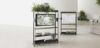 Mobile su ruote porta TV e lavagna con struttura metallica, staffa per fissaggio monitor fino a 43”, lavagna in conglomerato ligneo spessore 16 mm rivestita in laminato lucido bianco antigraffio, bordo perimetrale in ABS nero, mensola laterale, gancio portaborse, carter per salita cavi e ruote in nylon con freno.