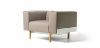 Brad upholstered lounge chair with multilayer wood inner structure, metal frame with beech feet and Trevira CS fabric upholstery