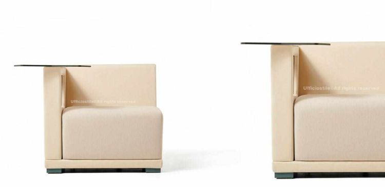 Poltrona per area lounge Ufficiostile con bracciolo elettrificato, scocca in legno imbottita, seduta in tessuto ignifugo Trevira CS e schienale in PVC, codice prodotto ITDMCI04.