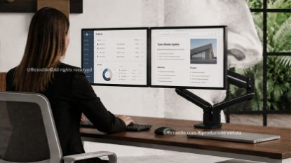 Tallo™ braccio monitor doppio Top Mount per postazioni multitasking, dotato di regolazione con molla a gas, slider VESA per l’allineamento laterale degli schermi, raggio di azione extra, finitura base nera e portata massima di 2 × 9 kg.