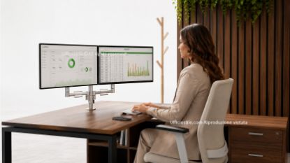 Skylon braccio monitor doppio statico per postazioni a due schermi, con fissaggio a morsetto per scrivanie da 15 a 50 mm, attacco VESA, finitura base nera, finiture opzionali bianca e argento e portata massima di 2 × 8 kg per monitor fino a 32”.